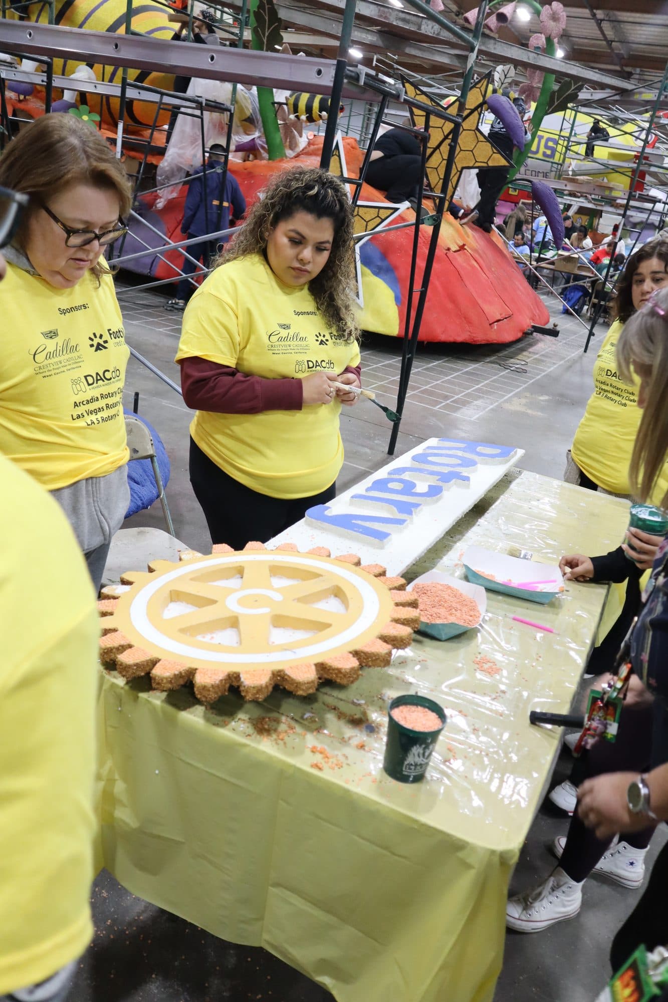 Decorating the Rotary Rose Parade float, frame 5