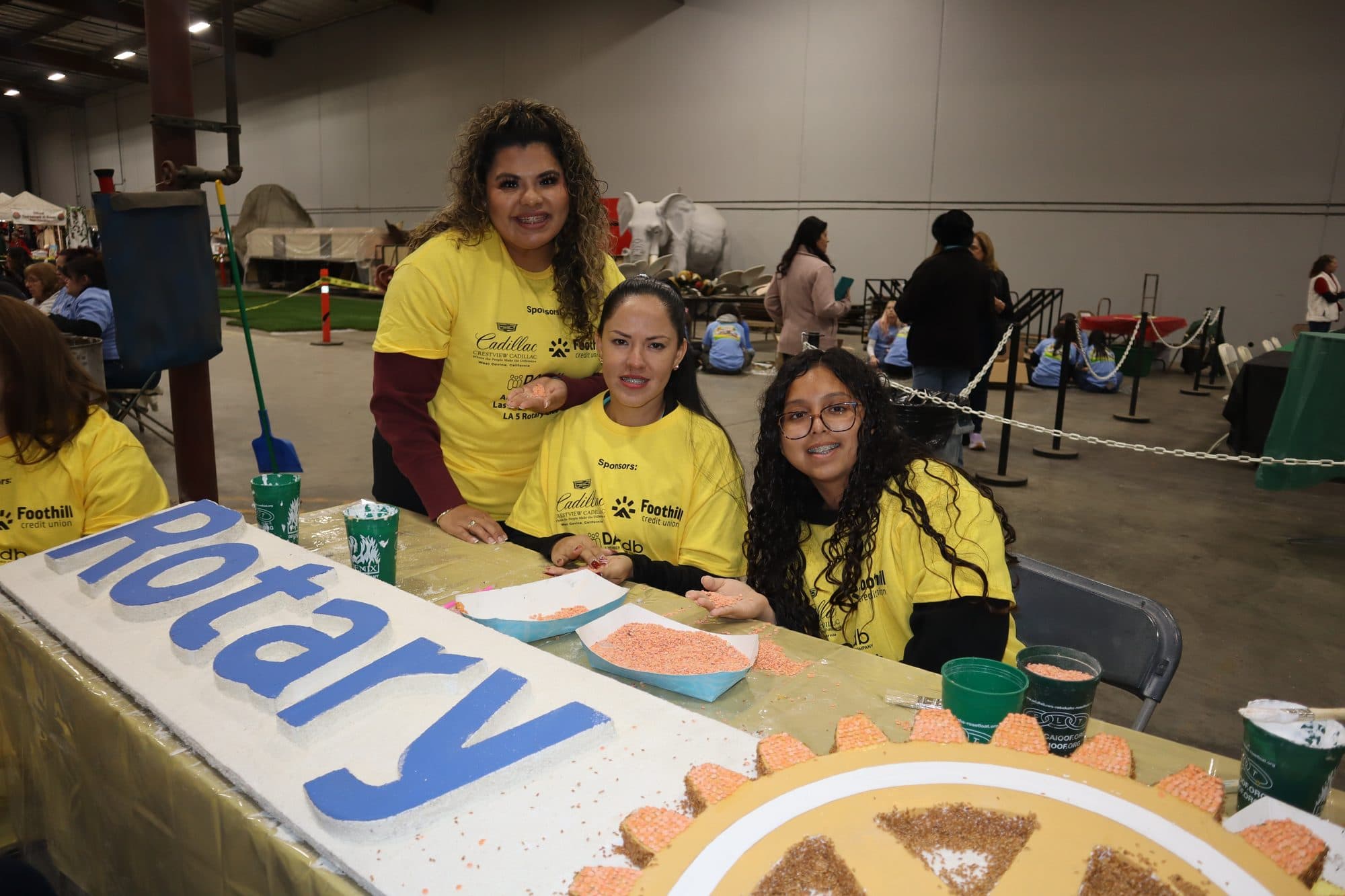 Decorating the Rotary Rose Parade float, frame 9
