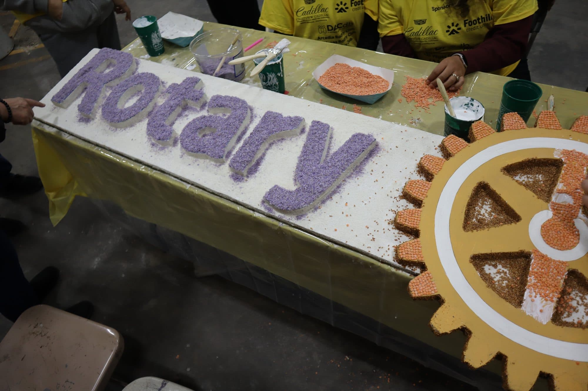 Decorating the Rotary Rose Parade float, frame 10