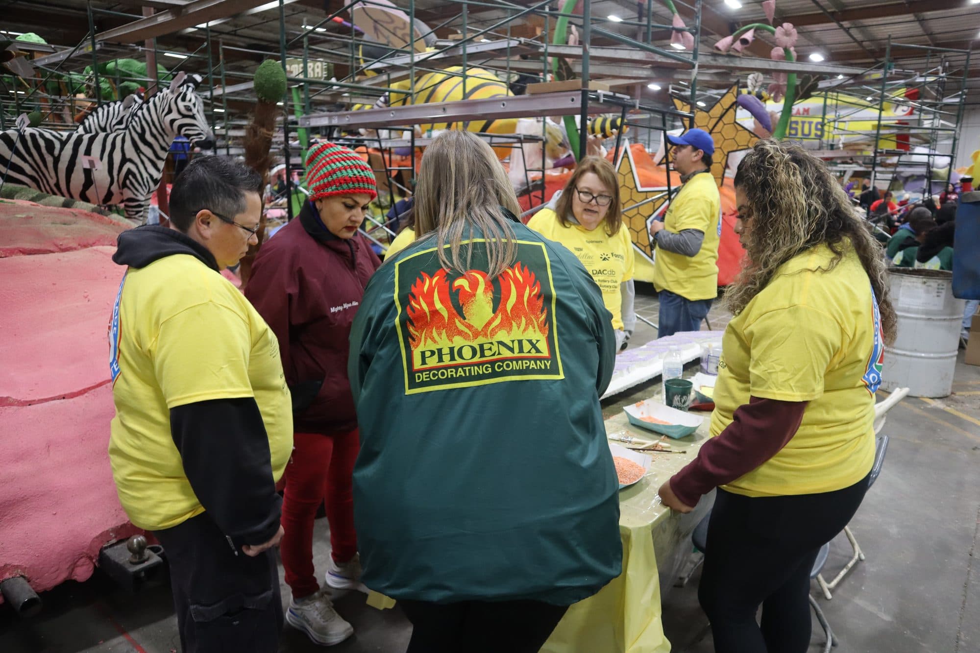 Decorating the Rotary Rose Parade float, frame 13
