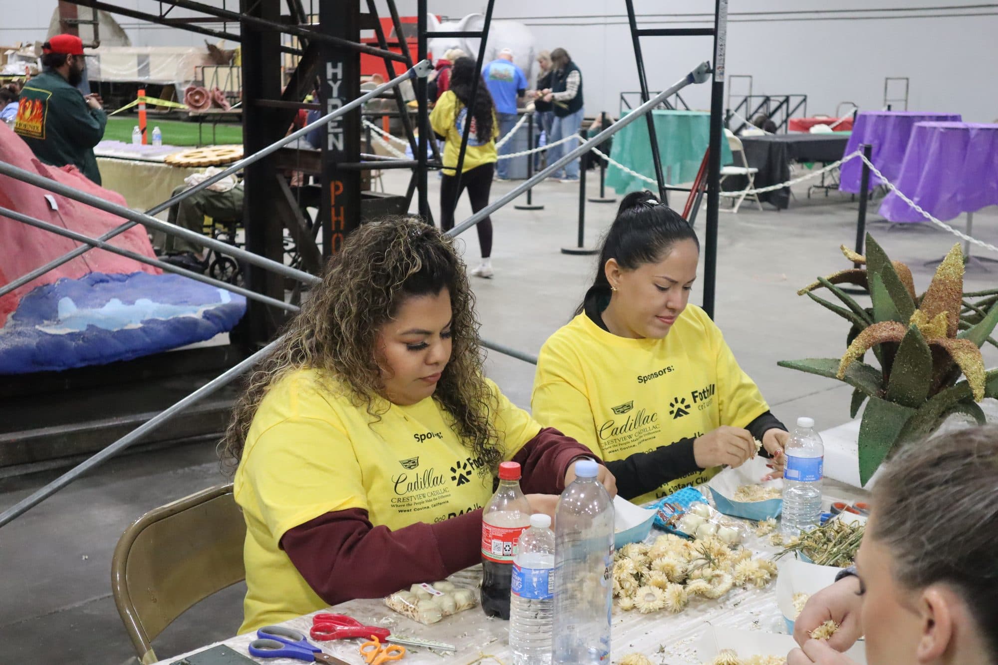 Decorating the Rotary Rose Parade float, frame 17