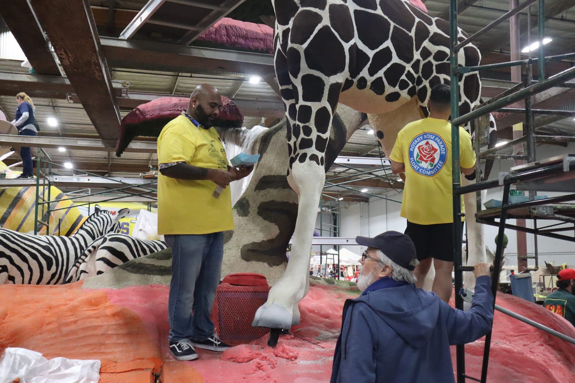 Decorating the Rotary Rose Parade float, frame 18