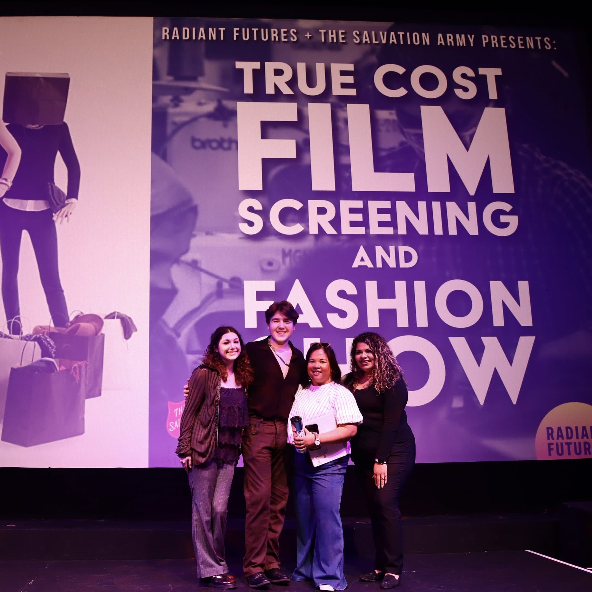Gregory Ferraro photographing the True Cost screening and fashion show, frame 1