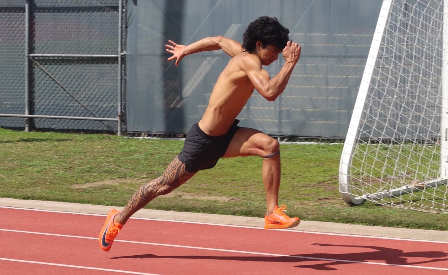 Camren Willis strides like a gazelle as he practices his long-jump sprints in the blazing sun at Cal State Fullerton.