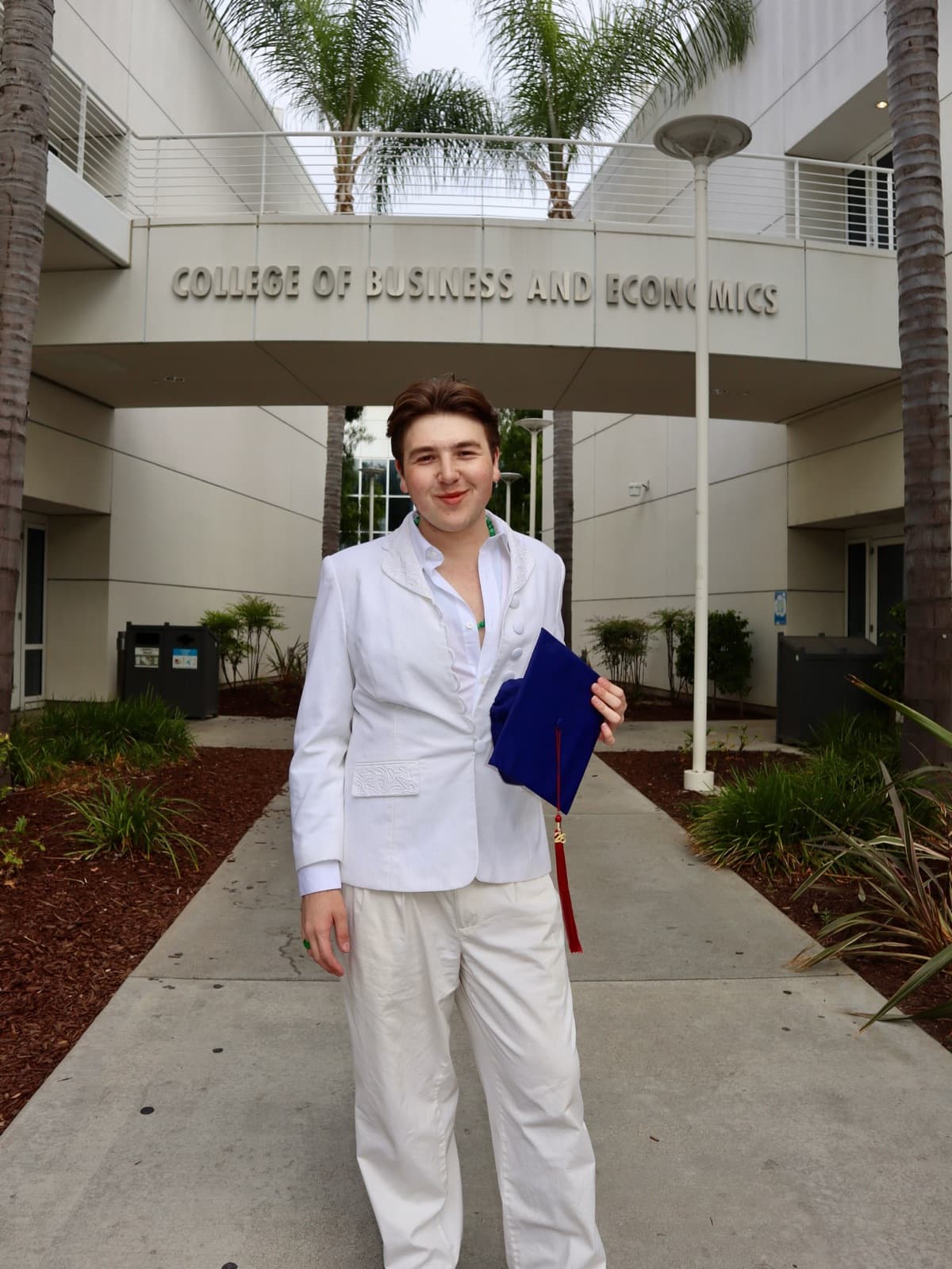 Gregory Ferraro’s graduation portraits · 12