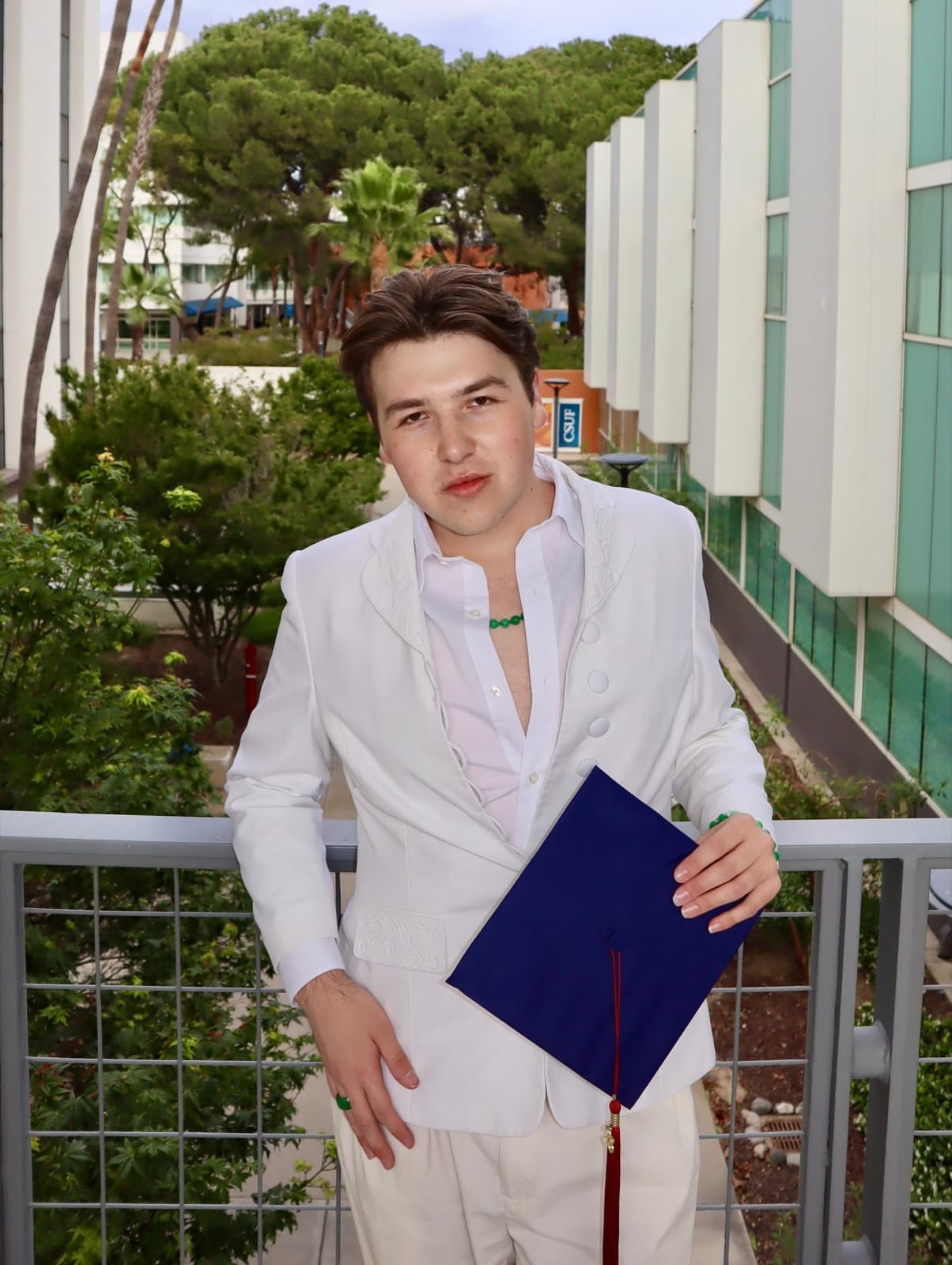 Gregory Ferraro’s graduation portraits · 14