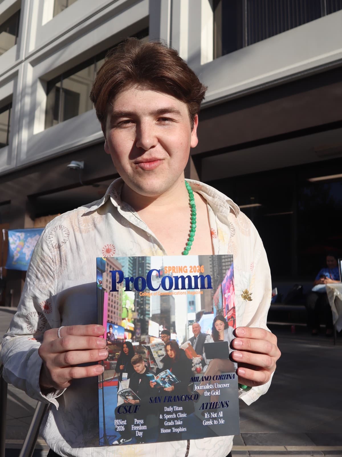 Gregory Ferraro holding the new issue · 01